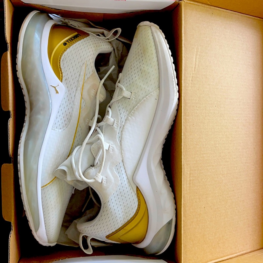 Gold and white sneakers for women.